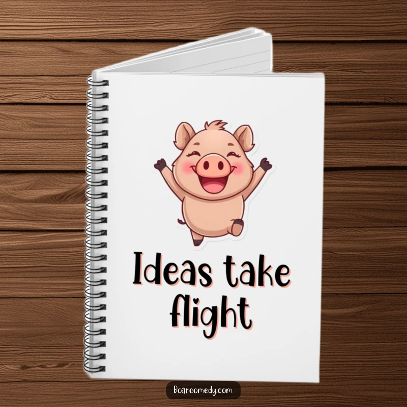 Funny round boar character leaping joyfully with a giant smile, adorning the cover of a notebook.