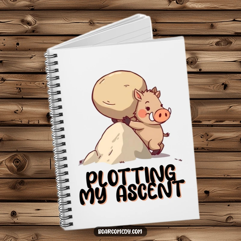 Funny notebook with a determined boar character pushing a large, round stone uphill.