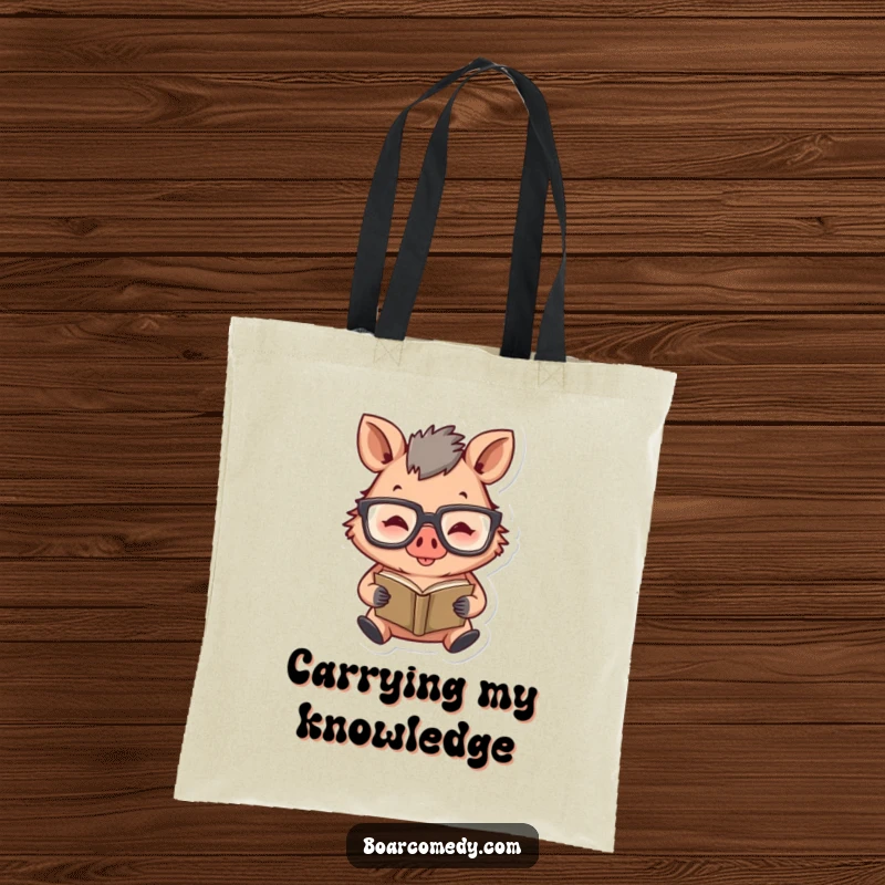 Funny tote bag illustrating a happy boar character wearing large glasses and diligently reading a tiny book.